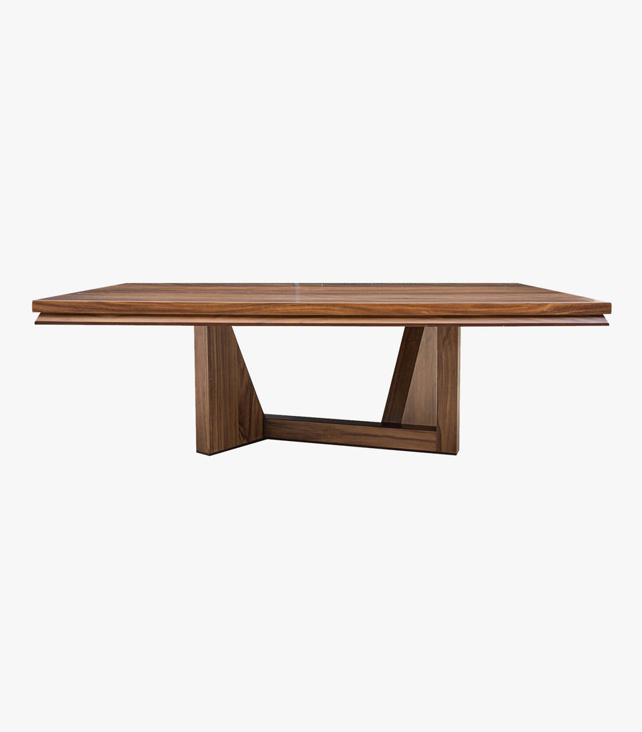 Mesa de comedor Corbelli de madera para 10 personas con acabado en parota, diseñada por Avanti Muebles.